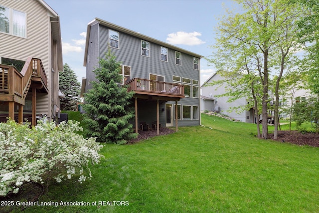 16851 Meadowbrook Dr, Haslett, MI 48840 - back of house with a lawn and a wooden deck