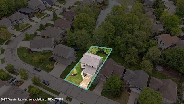 16851 Meadowbrook Dr, Haslett, MI 48840 - aerial view of residential area featuring property parcel outlined