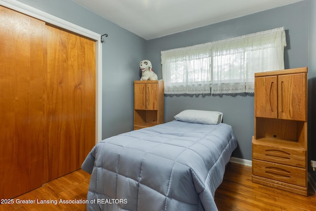 15157 Chetwyn Dr, Lansing, MI 48906 - bedroom featuring wood finished floors