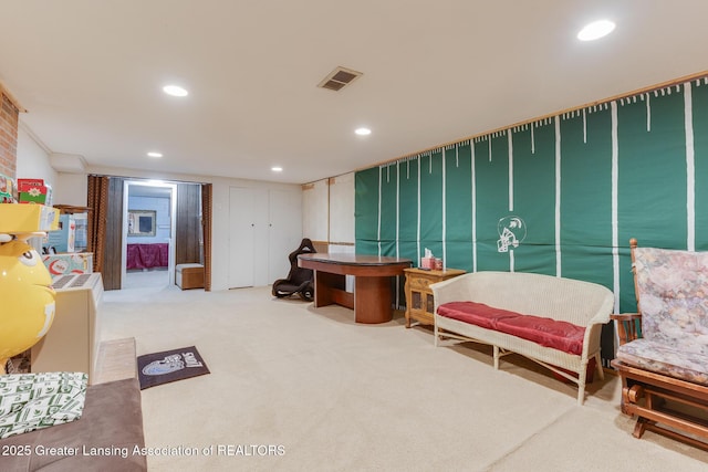 15157 Chetwyn Dr, Lansing, MI 48906 - living area with carpet and recessed lighting