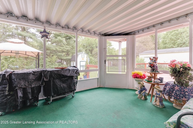 15157 Chetwyn Dr, Lansing, MI 48906 - sunroom / solarium featuring healthy amount of natural light