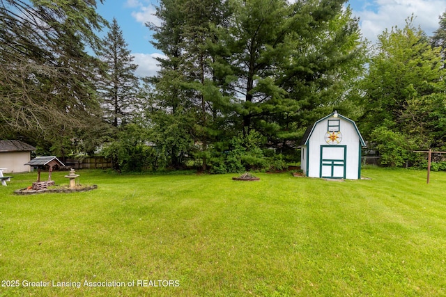 15157 Chetwyn Dr, Lansing, MI 48906 - view of yard with a fire pit
