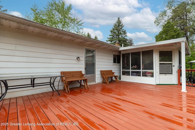15157 Chetwyn Dr, Lansing, MI 48906 - wooden terrace with a sunroom