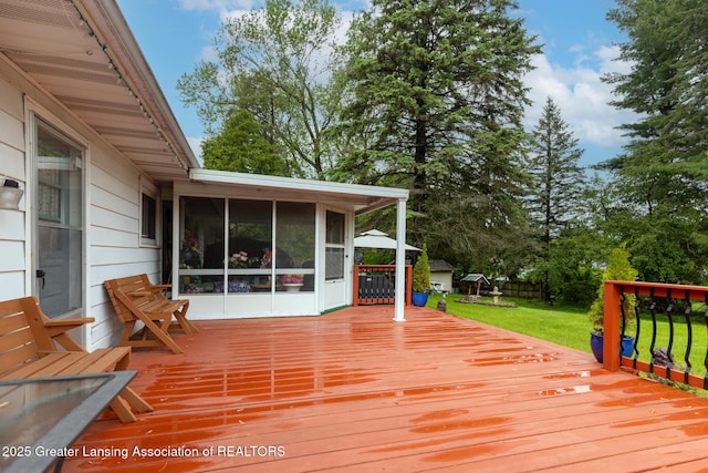 15157 Chetwyn Dr, Lansing, MI 48906 - wooden terrace featuring a sunroom