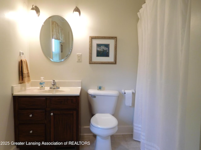 2229 Ives Rd, Leslie, MI 49251 - bathroom with vanity and tile patterned flooring