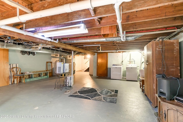 504 Iowa St, Alma, MI 48801 - unfinished basement with washer and clothes dryer