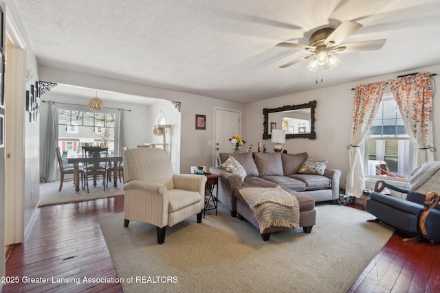 620 Irvington Ave, Lansing, MI 48910 - living area with ceiling fan, wood-type flooring, and a textured ceiling