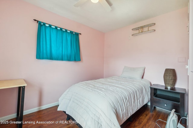 620 Irvington Ave, Lansing, MI 48910 - bedroom featuring wood finished floors, baseboards, and ceiling fan