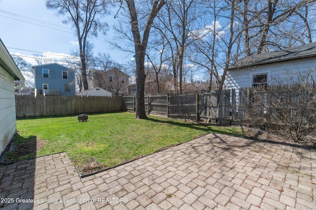 620 Irvington Ave, Lansing, MI 48910 - view of yard with a fire pit and a patio