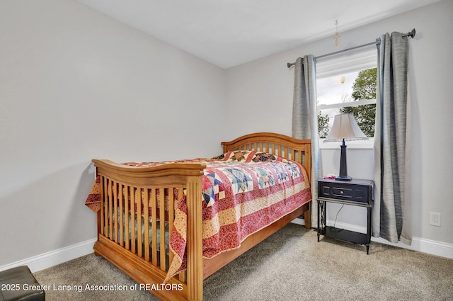 6415 Creyts Rd, Dimondale, MI 48821 - carpeted bedroom featuring baseboards