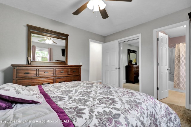 6415 Creyts Rd, Dimondale, MI 48821 - bedroom with carpet floors, ceiling fan, and connected bathroom
