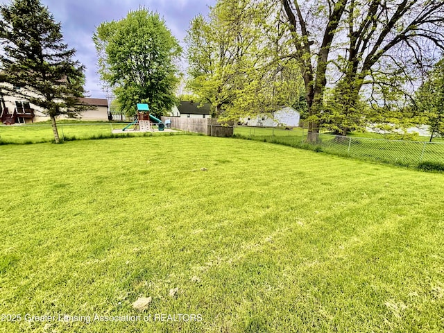 405 N Iris Ln, Laingsburg, MI 48848 - view of yard featuring a playground
