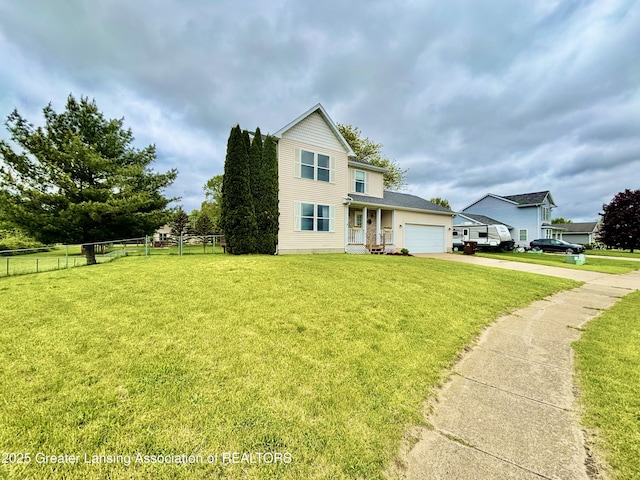 405 N Iris Ln, Laingsburg, MI 48848 - traditional home featuring driveway and an attached garage