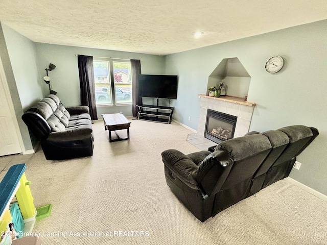 405 N Iris Ln, Laingsburg, MI 48848 - carpeted living room with a tile fireplace, baseboards, and a textured ceiling