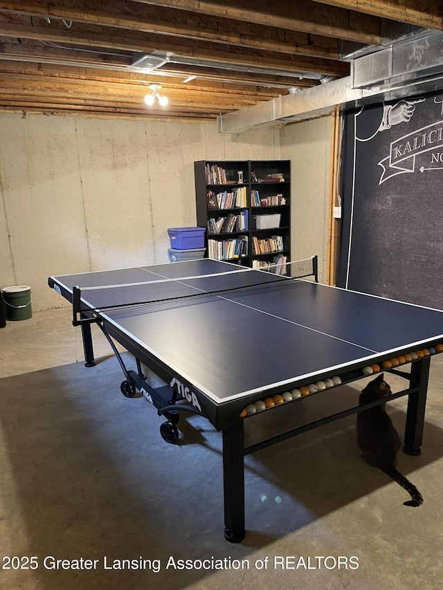 623 Horatio St, Charlotte, MI 48813 - rec room with finished concrete flooring