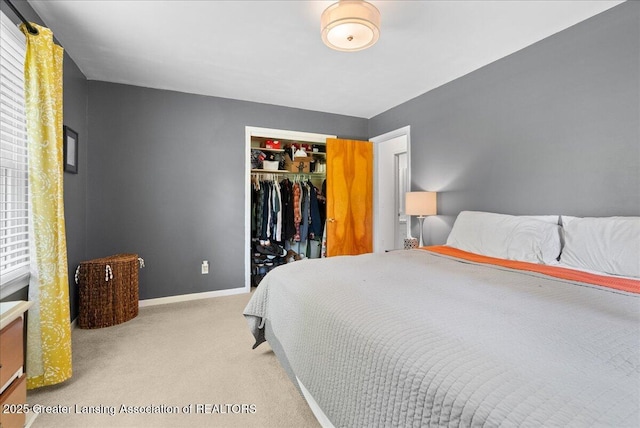 420 John R St, East Lansing, MI 48823 - bedroom with carpet floors, a closet, and baseboards