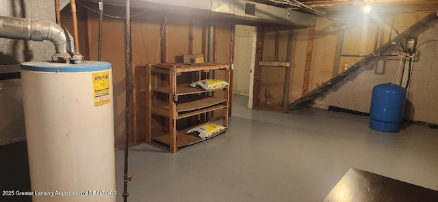 6622 Aurelius Rd, Lansing, MI 48911 - unfinished basement featuring gas water heater and a water pressure tank