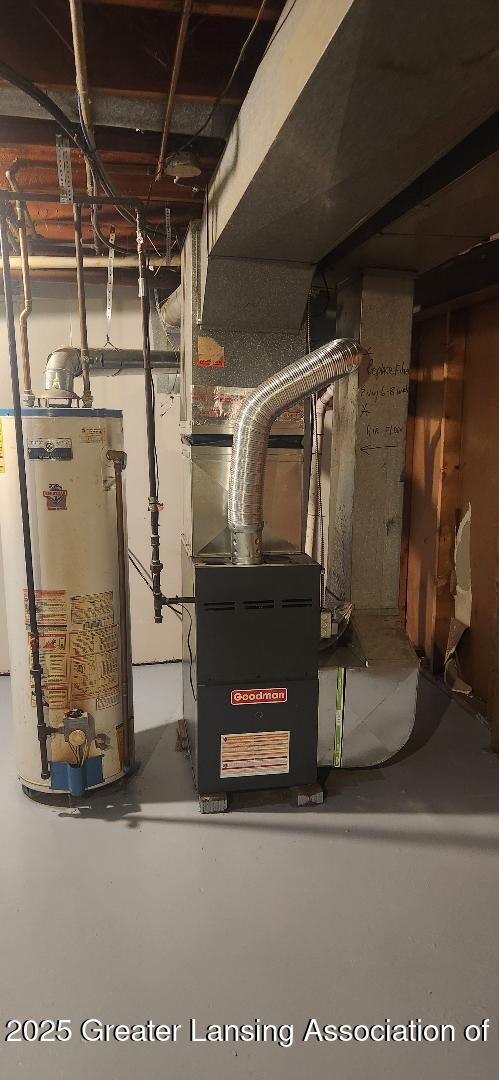 6622 Aurelius Rd, Lansing, MI 48911 - utility room featuring water heater