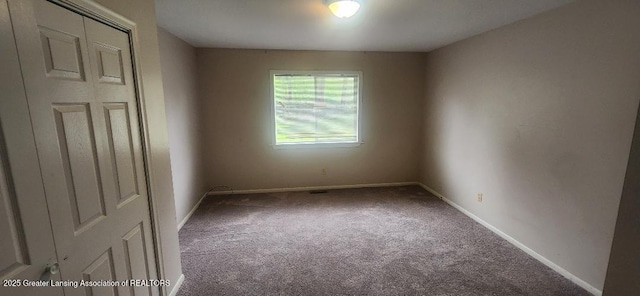 6622 Aurelius Rd, Lansing, MI 48911 - carpeted spare room featuring baseboards