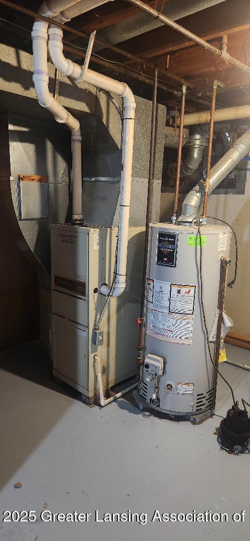 6622 Aurelius Rd, Lansing, MI 48911 - utility room with water heater
