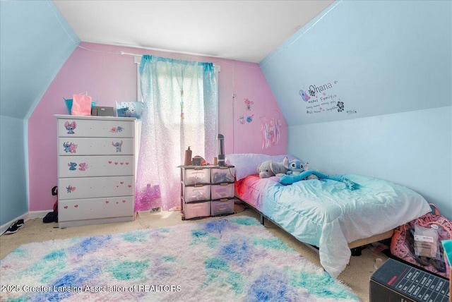 407 Kearney St, Portland, MI 48875 - bedroom featuring vaulted ceiling and carpet floors
