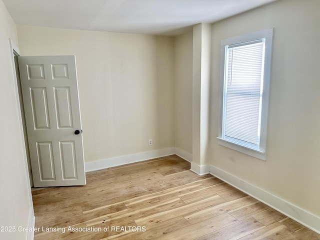 218 S Hayford Ave, Lansing, MI 48912 - empty room featuring light wood finished floors and baseboards