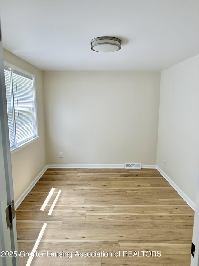 218 S Hayford Ave, Lansing, MI 48912 - unfurnished room featuring light wood finished floors and baseboards