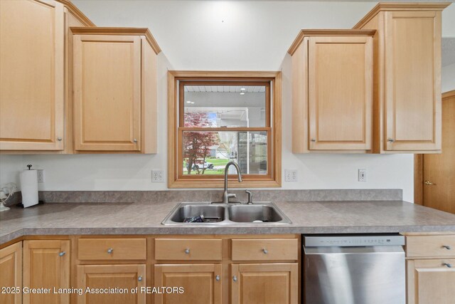 549 Riverwalk Dr, Mason, MI 48854 - kitchen featuring stainless steel dishwasher, a sink, and light brown cabinetry