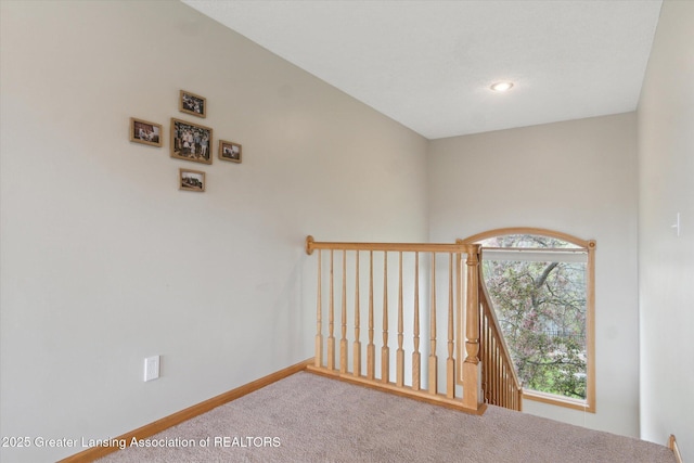 549 Riverwalk Dr, Mason, MI 48854 - stairway featuring carpet flooring and baseboards