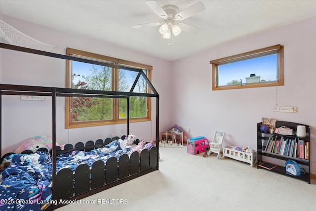 549 Riverwalk Dr, Mason, MI 48854 - bedroom featuring carpet flooring and ceiling fan