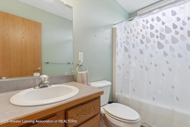 549 Riverwalk Dr, Mason, MI 48854 - bathroom with toilet, vanity, and shower / bath combo