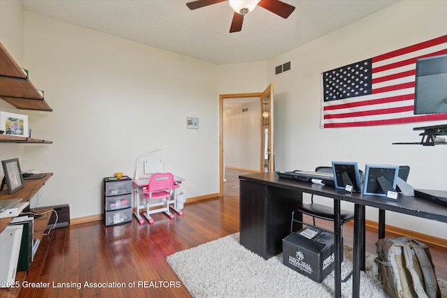 549 Riverwalk Dr, Mason, MI 48854 - home office featuring wood finished floors, baseboards, and ceiling fan