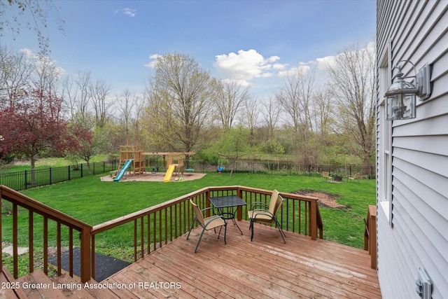 549 Riverwalk Dr, Mason, MI 48854 - deck with a playground