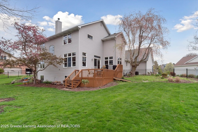 549 Riverwalk Dr, Mason, MI 48854 - rear view of house featuring a deck and a chimney