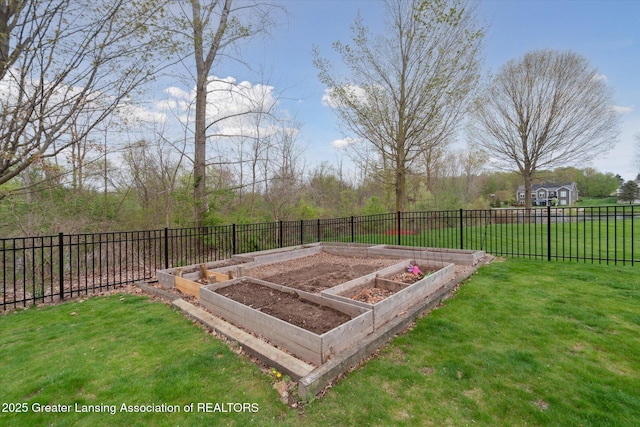 549 Riverwalk Dr, Mason, MI 48854 - view of yard featuring a vegetable garden