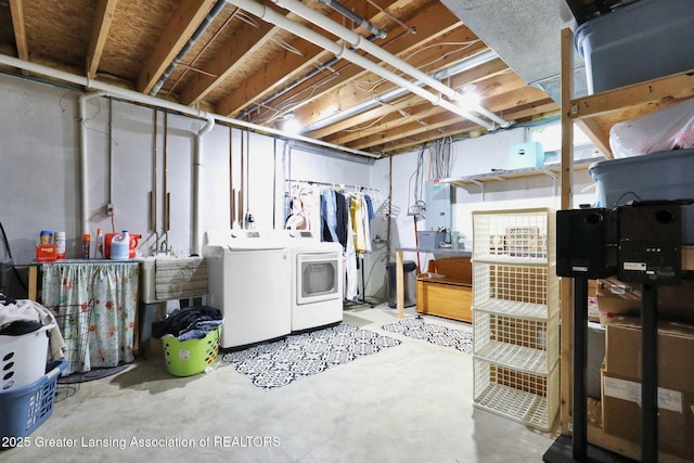 722 Fieldview Dr, Grand Ledge, MI 48837 - unfinished basement featuring washer and dryer
