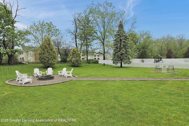 722 Fieldview Dr, Grand Ledge, MI 48837 - view of yard with an outdoor fire pit