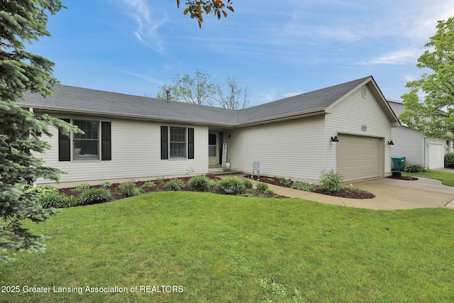 722 Fieldview Dr, Grand Ledge, MI 48837 - ranch-style home featuring an attached garage, concrete driveway, and a front lawn