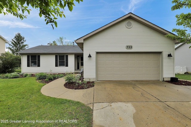 722 Fieldview Dr, Grand Ledge, MI 48837 - ranch-style house with an attached garage, concrete driveway, and a front lawn