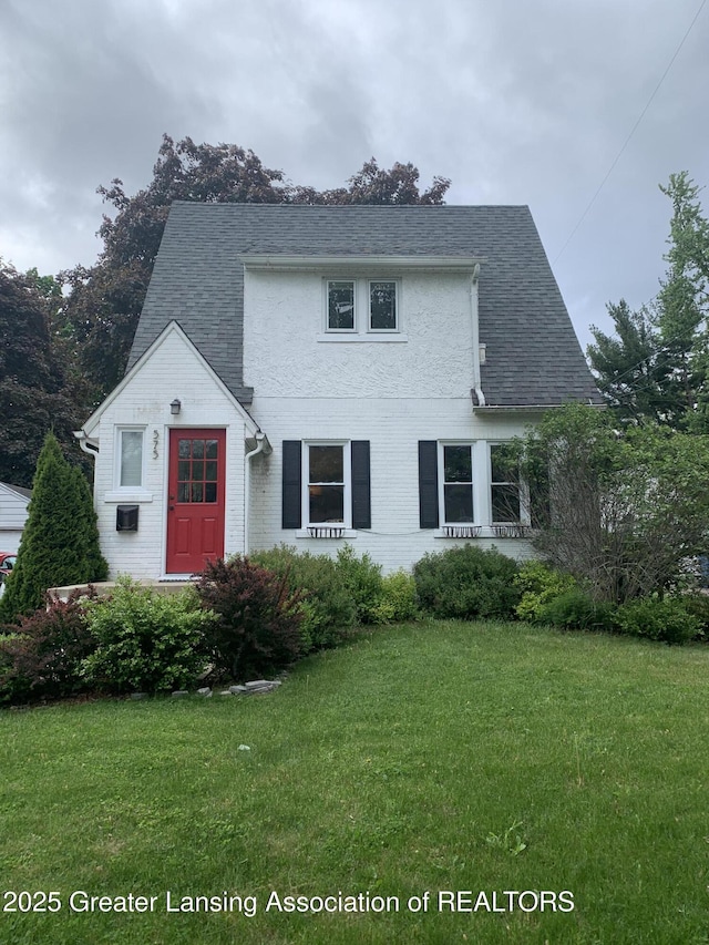 575 Brookland Blvd, Lansing, MI 48910 - view of front of house featuring a front lawn