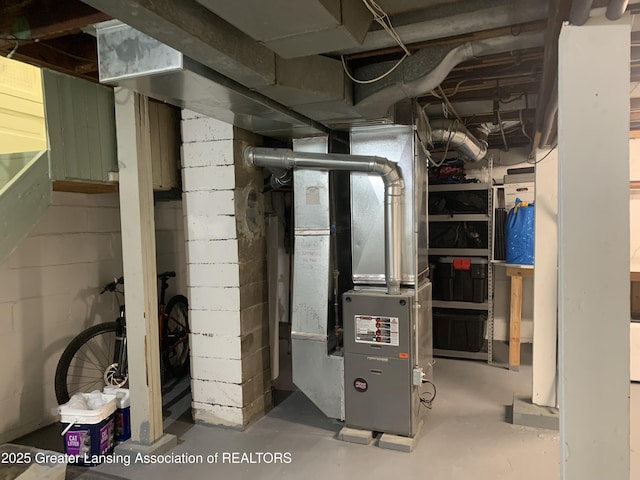 575 Brookland Blvd, Lansing, MI 48910 - utility room with heating unit