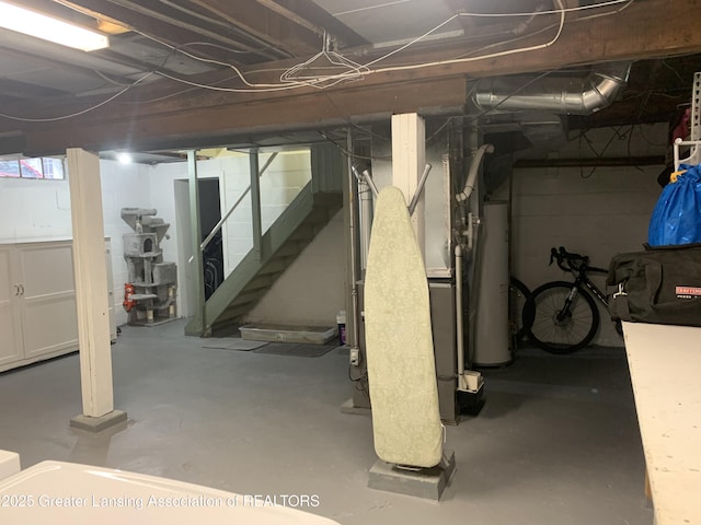 575 Brookland Blvd, Lansing, MI 48910 - basement with stairs, gas water heater, and heating unit