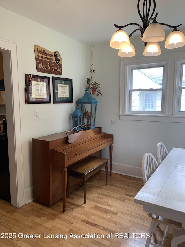 575 Brookland Blvd, Lansing, MI 48910 - dining room with light wood finished floors and baseboards
