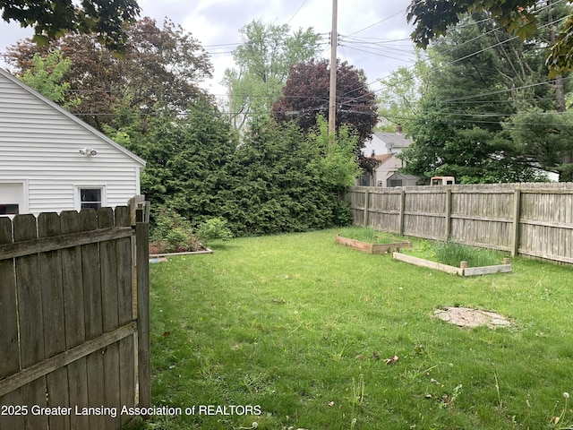 575 Brookland Blvd, Lansing, MI 48910 - view of yard with a garden