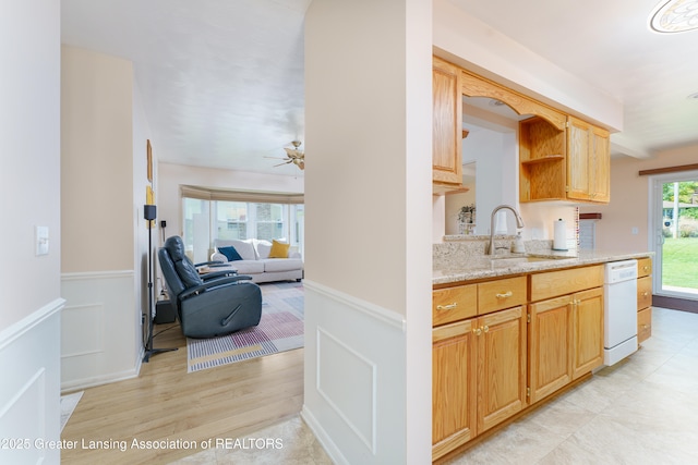 2305 Post Oak Ln, Lansing, MI 48912 - kitchen featuring a sink, dishwasher, ceiling fan, light stone countertops, and open shelves