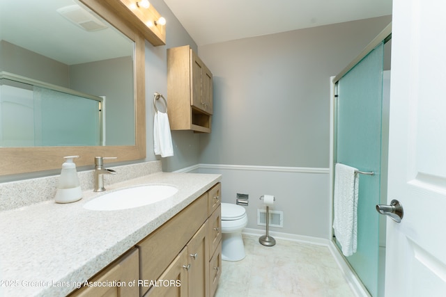 2305 Post Oak Ln, Lansing, MI 48912 - full bathroom with vanity, a stall shower, toilet, baseboards, and tile patterned floors