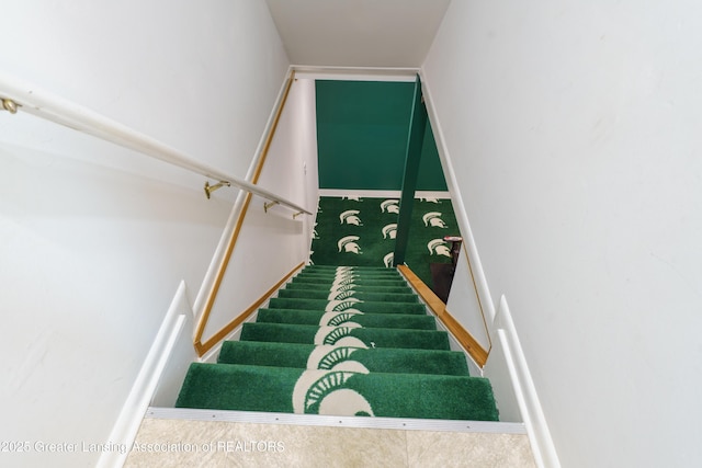 2305 Post Oak Ln, Lansing, MI 48912 - staircase with carpet floors