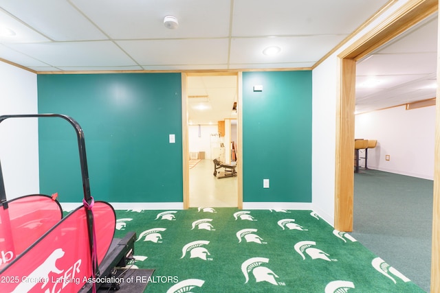 2305 Post Oak Ln, Lansing, MI 48912 - workout area with baseboards, a drop ceiling, and carpet