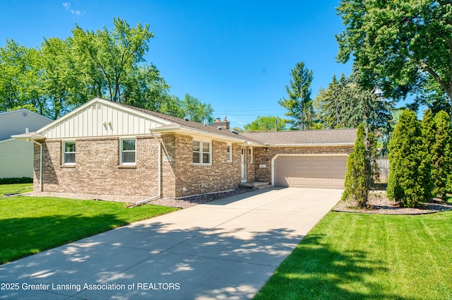2305 Post Oak Ln, Lansing, MI 48912 - ranch-style home featuring an attached garage, concrete driveway, brick siding, a front yard, and a chimney