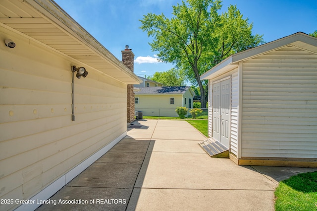 2305 Post Oak Ln, Lansing, MI 48912 - view of patio with cooling unit